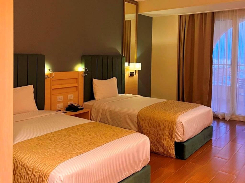 rooms-main-building-family-room-side-sea-view